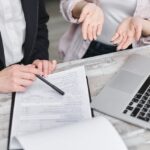 Two lawyers discussing the New York Rules of Professional Conduct