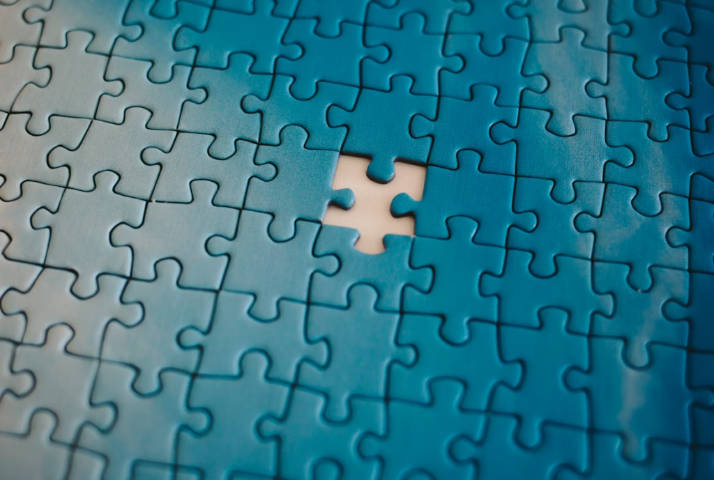 A puzzle with one piece missing